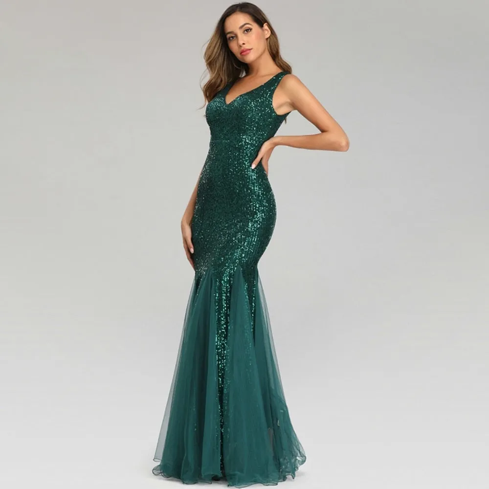 Stunningly sequined  metallic V neck mermaid floor length formal  gown