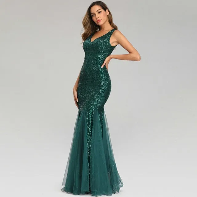 Stunningly sequined  metallic V neck mermaid floor length formal  gown